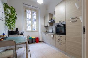 TV a/nebo společenská místnost v ubytování Cozy Private Room in Milan - Convenient Location