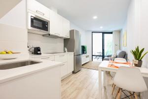 Η κουζίνα ή μικρή κουζίνα στο Famara Suites