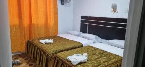 Hostal Private-Lima Aiport客房内的一张或多张床位