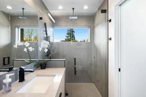a bathroom with a sink and a shower at Wallingford Getaway in Seattle +41 photos