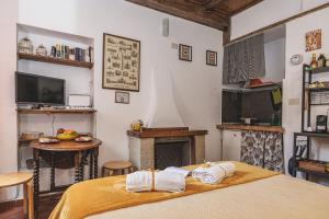 Posteľ alebo postele v izbe v ubytovaní Campo De Fiori - Casa Pettinari 78
