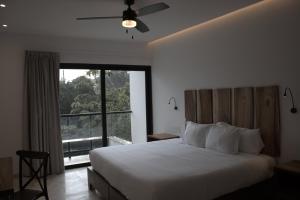 Katil atau katil-katil dalam bilik di Hotel B10 - Distinctive Hotel-