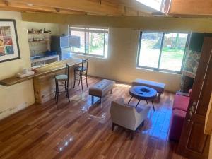 an overhead view of a living room with a bar at Cabaña Paty in Mazamitla