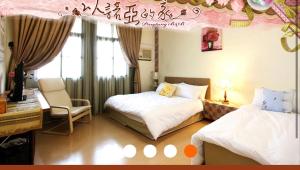Vuode tai vuoteita majoituspaikassa 以諾亞的家一館