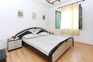 Posteľ alebo postele v izbe v ubytovaní House Marcelo