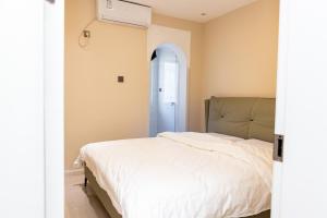 Llit o llits en una habitació de Aurora B&B