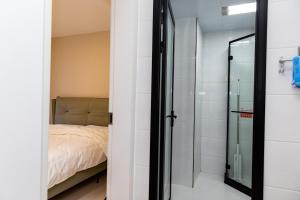 Llit o llits en una habitació de Aurora B&B