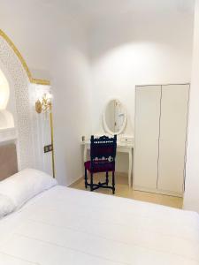Rúm í herbergi á Hotel Palace tanger