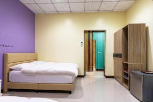Letto o letti in una camera di 日升咖啡民宿