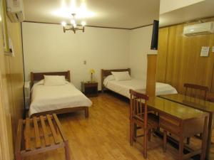 Postel nebo postele na pokoji v ubytování Hotel Vegas