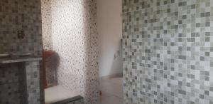 a bathroom with a shower and a toilet in it at Aconchego de Matias in Matias Barbosa