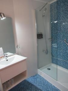 Koupelna v ubytování Hotel Vegas