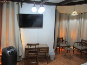 TV a/nebo společenská místnost v ubytování Hotel Vegas