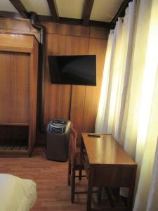 TV a/nebo společenská místnost v ubytování Hotel Vegas