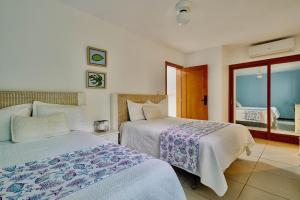 Ένα ή περισσότερα κρεβάτια σε δωμάτιο στο Oceanfront Apt W- Private Beach - Las Terrenas +36 φωτογραφίες