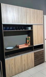 a large wooden cabinet with a plate on it at Casa Il cuore felice in San Rafael