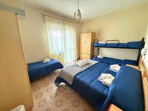 Postel nebo postele na pokoji v ubytování Hotel Blurelda