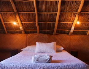 Postel nebo postele na pokoji v ubytování La Redonda Sayulita Hostal + 37 fotografií