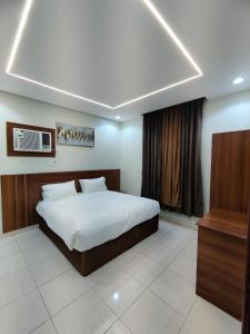 Ένα ή περισσότερα κρεβάτια σε δωμάτιο στο Orcan apartment