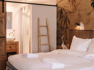 Postel nebo postele na pokoji v ubytování Casa del Mar Zandvoort