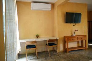 Μια τηλεόραση ή/και κέντρο ψυχαγωγίας στο Casa Eve room 4 +14 φωτογραφίες