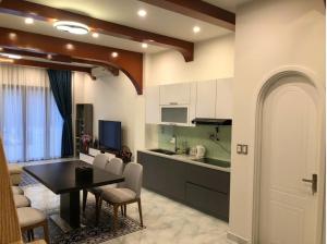 Kuchyň nebo kuchyňský kout v ubytování Longs Beach House - Wonderland Hồ Tràm