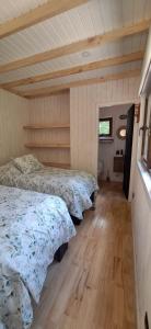 Postel nebo postele na pokoji v ubytování CasaVerde Hostal Ecologico