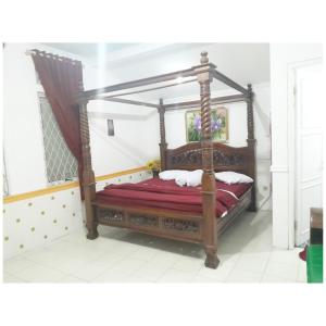 Postel nebo postele na pokoji v ubytování Rhabdia Villa Kota Bunga + 7 fotografií