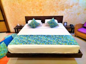 Postel nebo postele na pokoji v ubytování Signature Boracay Punta Rosa