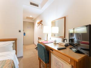 Postel nebo postele na pokoji v ubytování Tabist Hotel Mercury Asakusabashi