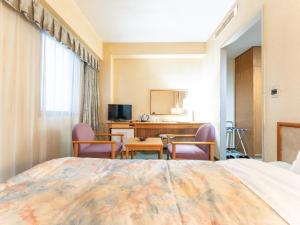 TV a/nebo společenská místnost v ubytování Tabist Hotel Mercury Asakusabashi
