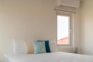 Postel nebo postele na pokoji v ubytování Beach Homes Aruba
