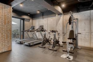 a gym with treadmills and elliptical machines at Boga Mexico City by Lumina in Mexico City