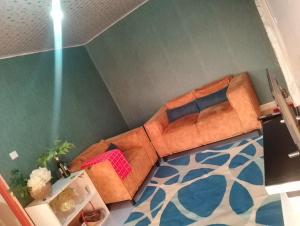 Posezení v ubytování Lovely one bedroom airbb in THIKA with WiFi ,ample parking-next to the road + 6 fotografií