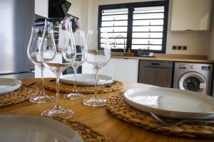 Köök või kööginurk majutusasutuses SUNSET L'argonaute T3 70 m2 jardin et terrasse vue lagon