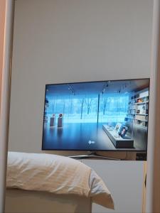 TV a/nebo společenská místnost v ubytování Smile Home