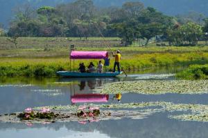 a group of people on a boat in the water at TrajinerasNativitasAdventureTours in Mexico City