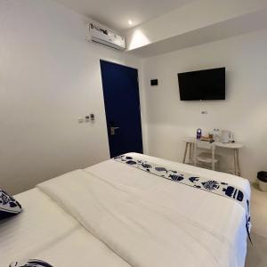 Postel nebo postele na pokoji v ubytování Little Mykonos