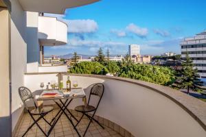 Ein Balkon oder eine Terrasse in der Unterkunft Arcom Palace