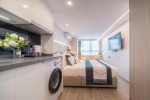 Ένα ή περισσότερα κρεβάτια σε δωμάτιο στο Yunbo Hotel