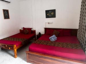 Фотография из галереи Ubay Guest House в Тринкомали +41 фотография