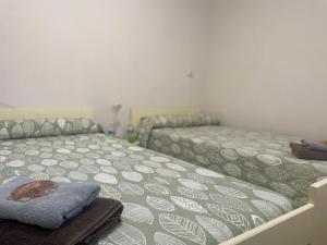 Postel nebo postele na pokoji v ubytování Las Hadas Albergue -solo para Peregrinos - Vegano -Bar