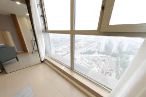 Зображення з фотогалереї помешкання Shanghai Suju Service Apartment Pudong Wanda Plaza Zhoupu Subway Station Branch у Шанхаї
