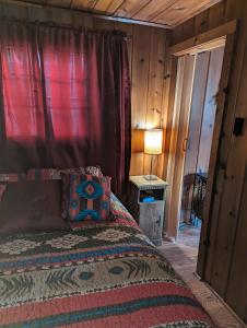 Postel nebo postele na pokoji v ubytování Northern Lights Beach Resort