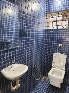 Ένα μπάνιο στο Casa 714 2BHK Apartment by Stilla Ro Hospitality LLP