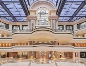 a view of the lobby of a building with a large ceiling at Grand Hyatt Taipei in Taipei