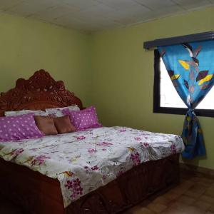 Llit o llits en una habitació de Bel Appartement 2 chambres meublé à Bafoussam