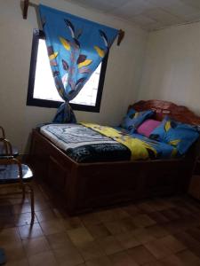 Llit o llits en una habitació de Bel Appartement 2 chambres meublé à Bafoussam