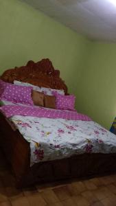 Llit o llits en una habitació de Bel Appartement 2 chambres meublé à Bafoussam