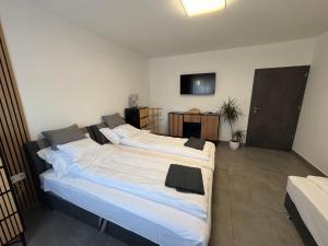Postel nebo postele na pokoji v ubytování PP Apartman